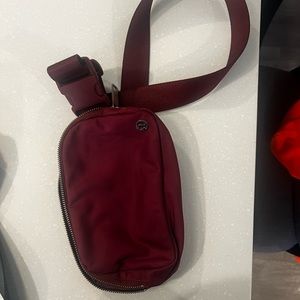 Maroon Lululemon belt bag